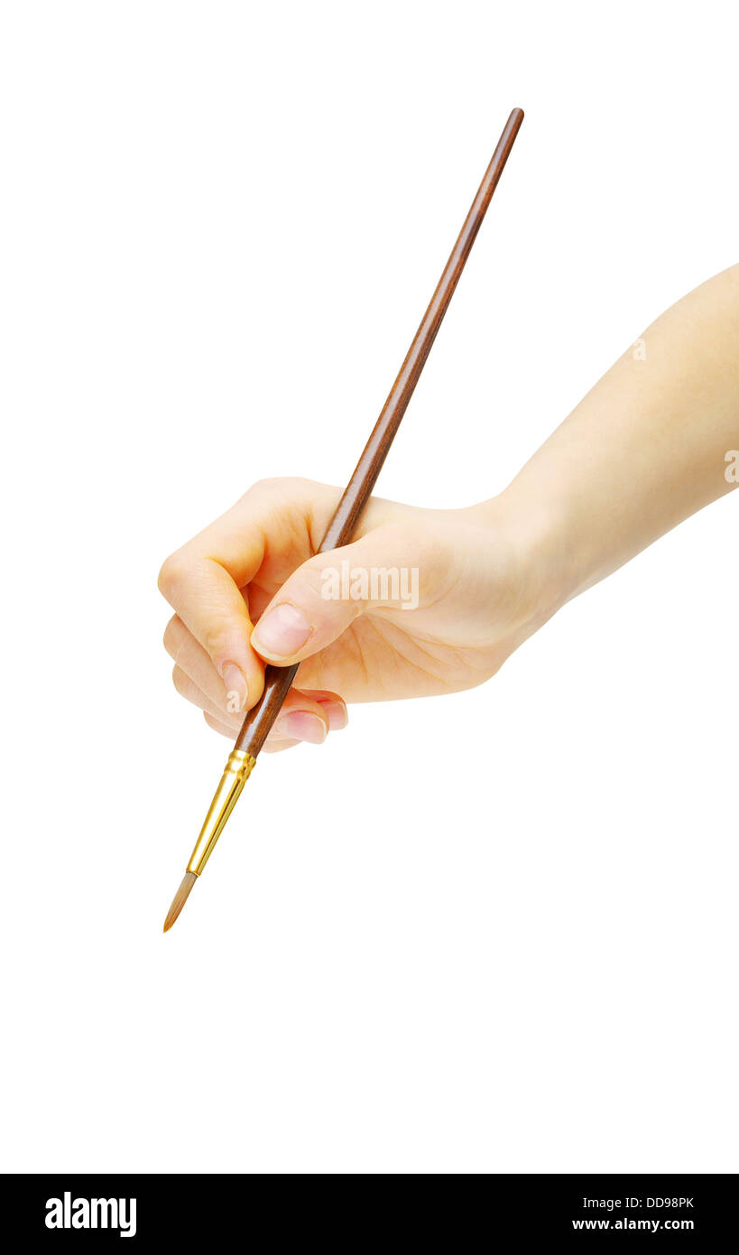 brush in hand Stock Photo Alamy