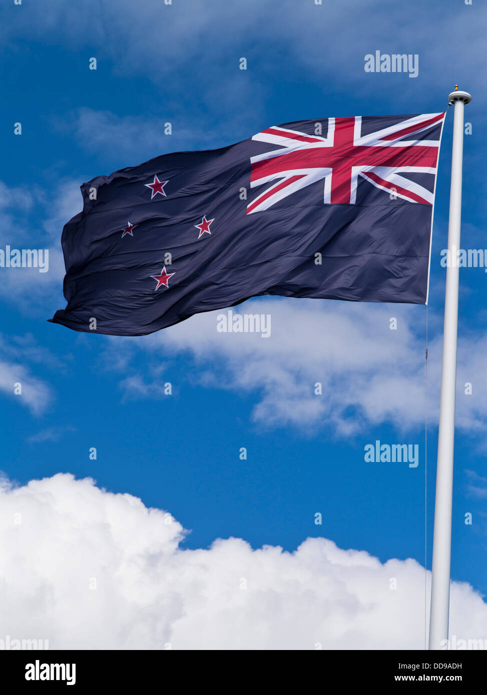 dh  FLAG NEW ZEALAND National flag flying white flagpole nz Stock Photo