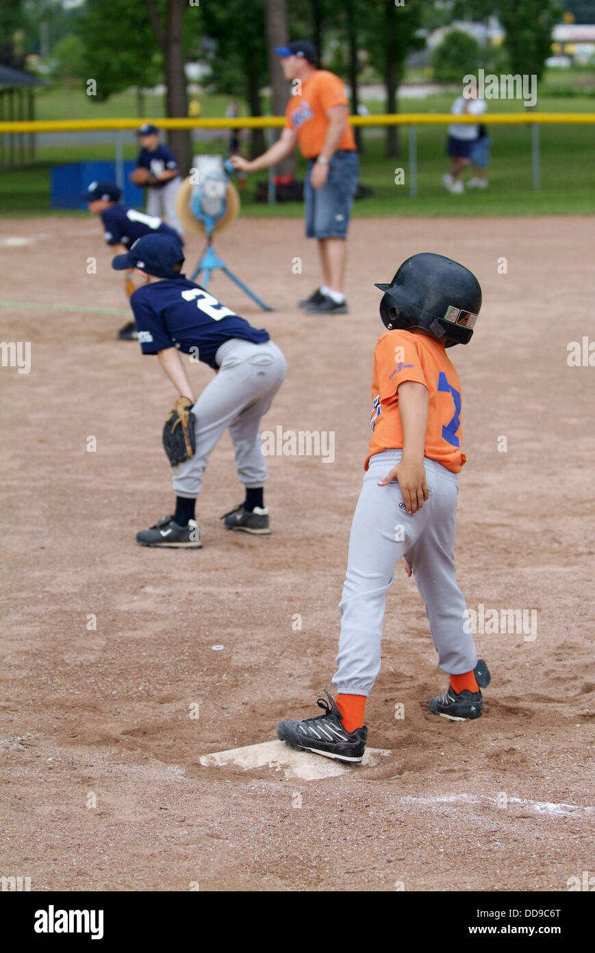 Softball little league action Stock Photo Alamy