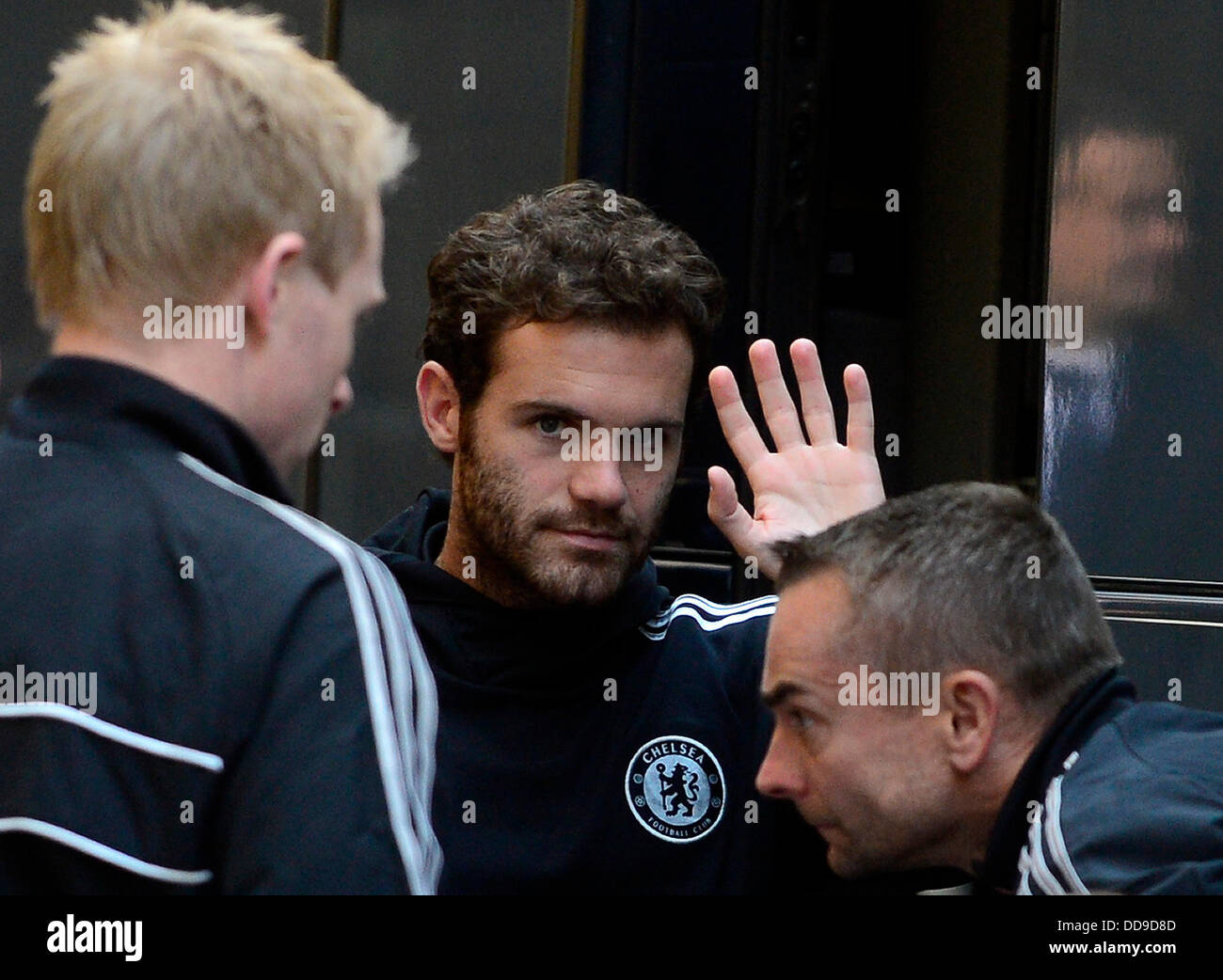 Prague, Czech Republic. 29th Aug, 2013. Juan Manuel Mata from Chelsea greets bystanders at a hotel in Prague, Thursday, Aug. 29, 2013. FC Chelsea faces FC Bayern Munich in Super Cup soccer match on Friday Aug. 30. Credit:  Roman Vondrous/CTK Photo/Alamy Live News Stock Photo