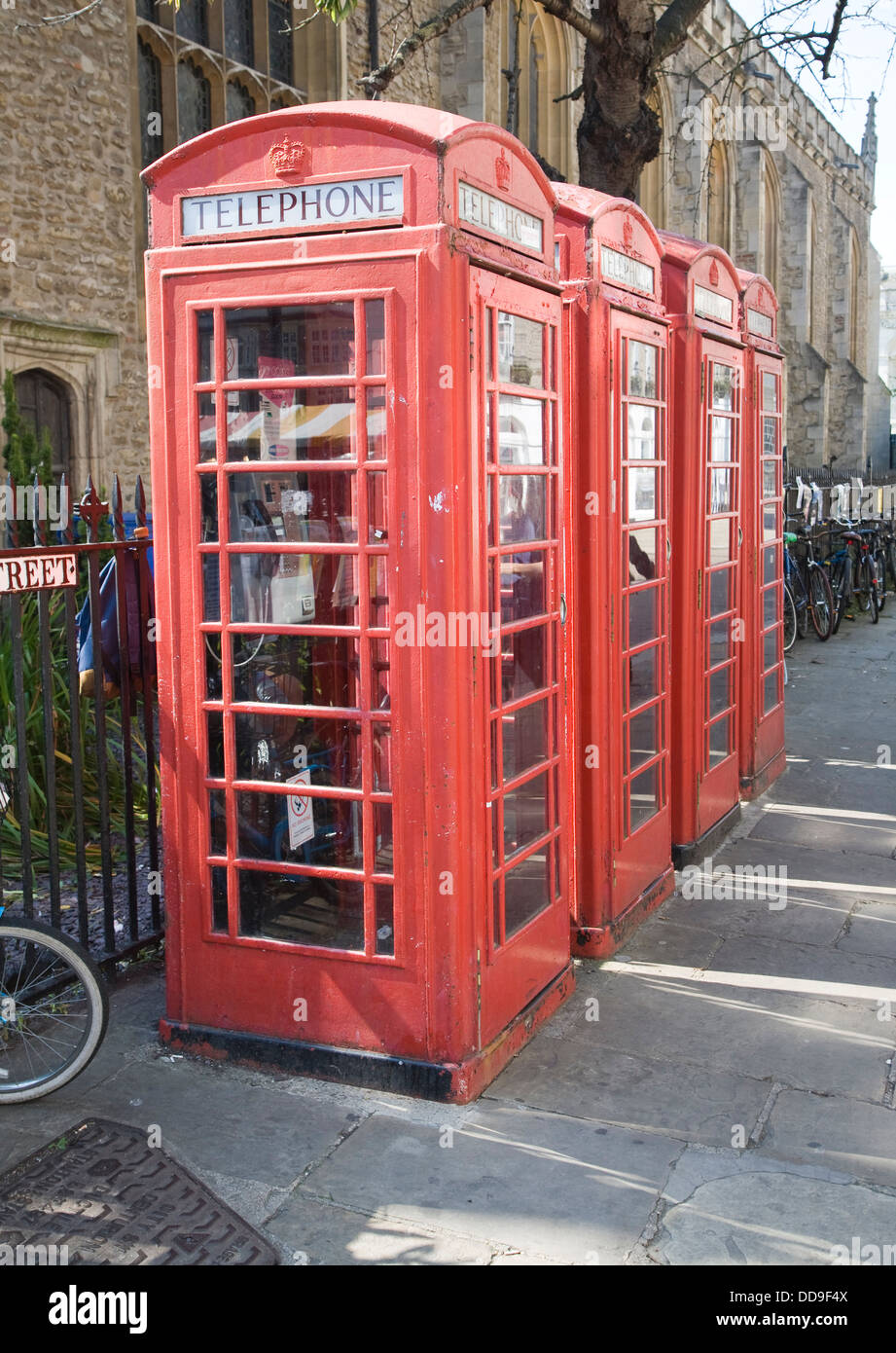 Red traditional style telephone boxes Cambridge England Stock Photo