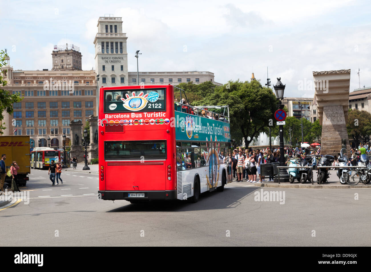 Open top tourist bus in Plaza de Catalunya Barcelona Stock Photo