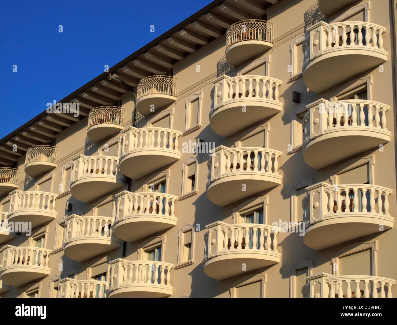 Balcony row on apartment building in touristic area of Cervia, Rimini, Italy. Stock Photo