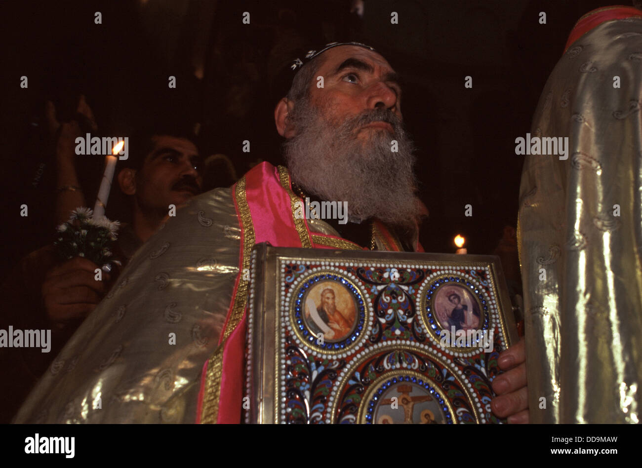 Syrian Orthodox priest at the ceremony of the Holy Fire at the Holy Sepulchre church East Jerusalem Israel Stock Photo