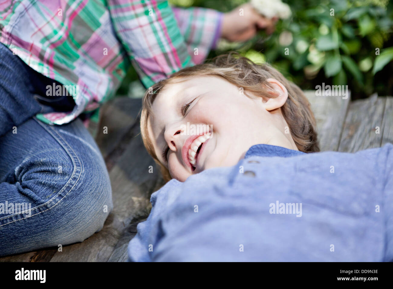 Germany, Cologne, Children playing in playground Stock Photo Alamy