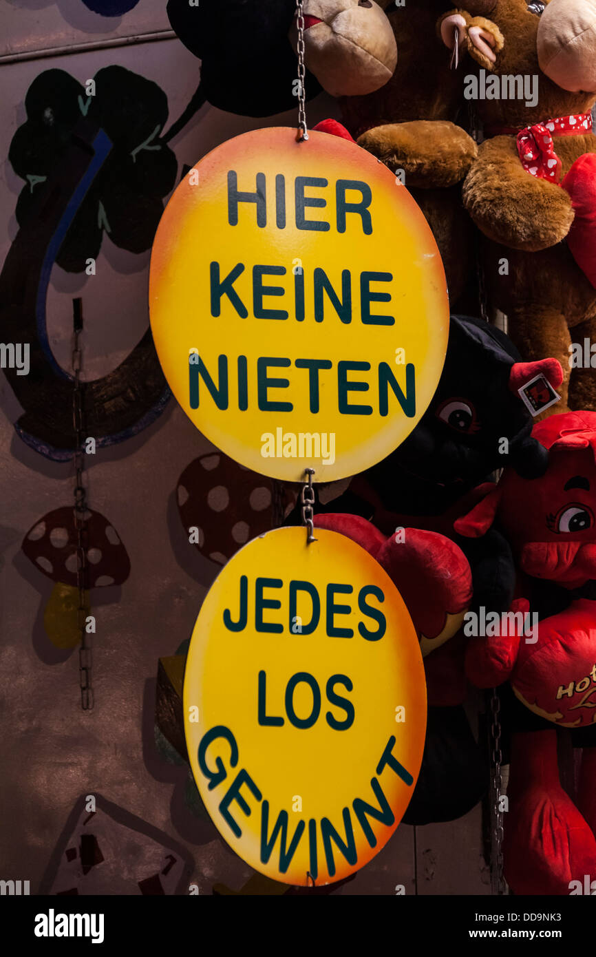 Germany, Baden Wuerttemberg, Laupheim, Sign board hanging against toys, close up Stock Photo