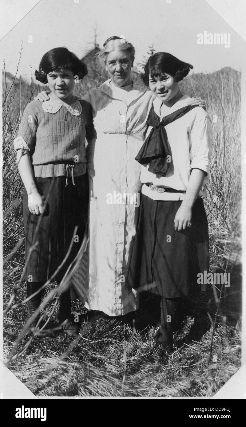 Mrs. Native Mrs. Minthorn and two Native American girls, likely from a Native ...
