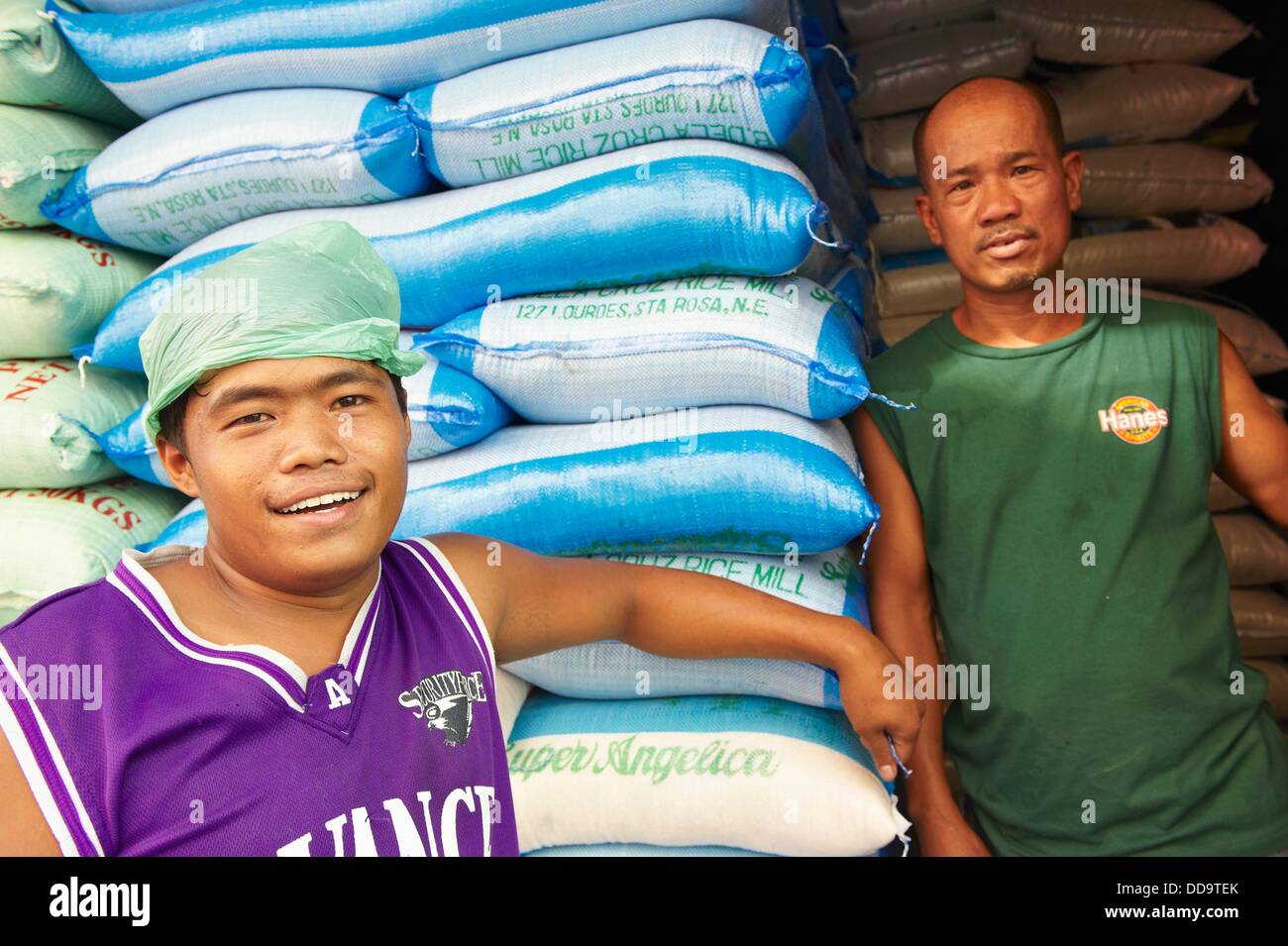 workers at rice wholesale depot  mandaluyong city  Metro Manila  Philippines Stock Photo