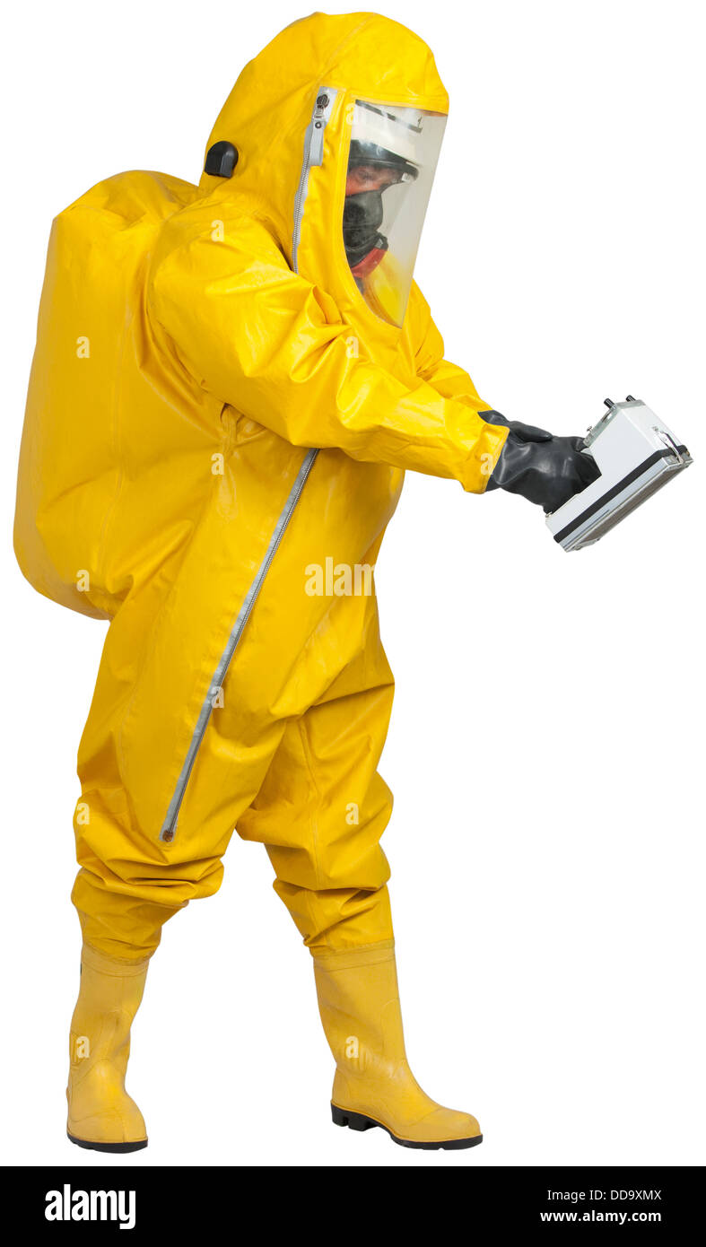 Mature man in yellow protective suit with holding meter for radioactivity Stock Photo