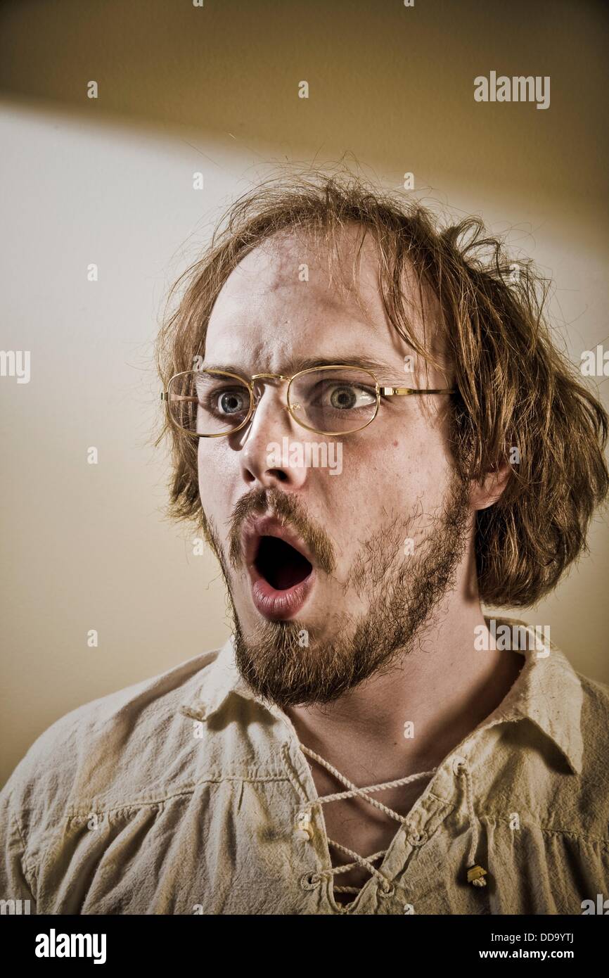 Young man wearing glasses Stock Photo - Alamy