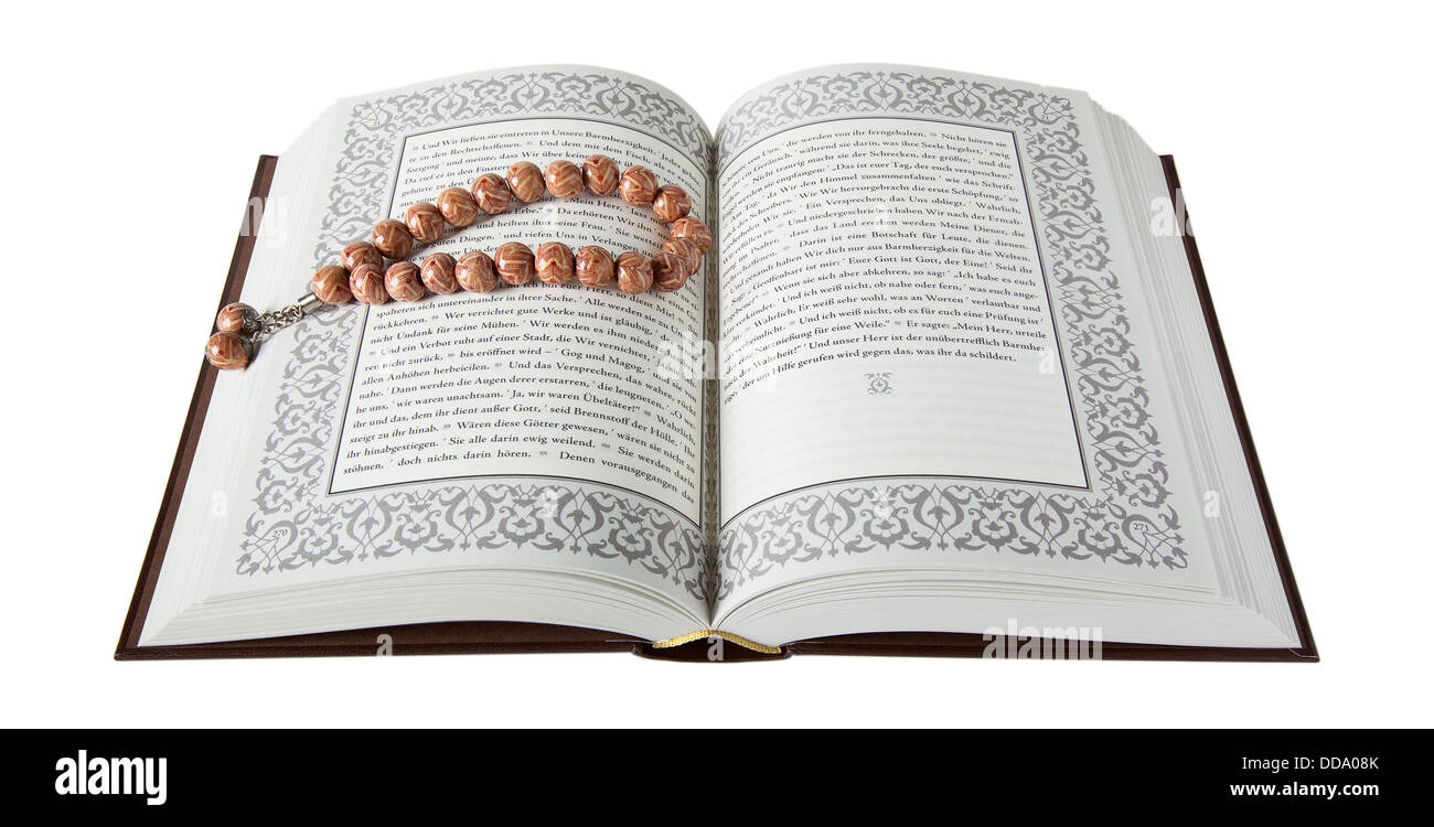 Quran with prayer beads on white background, close up Stock Photo
