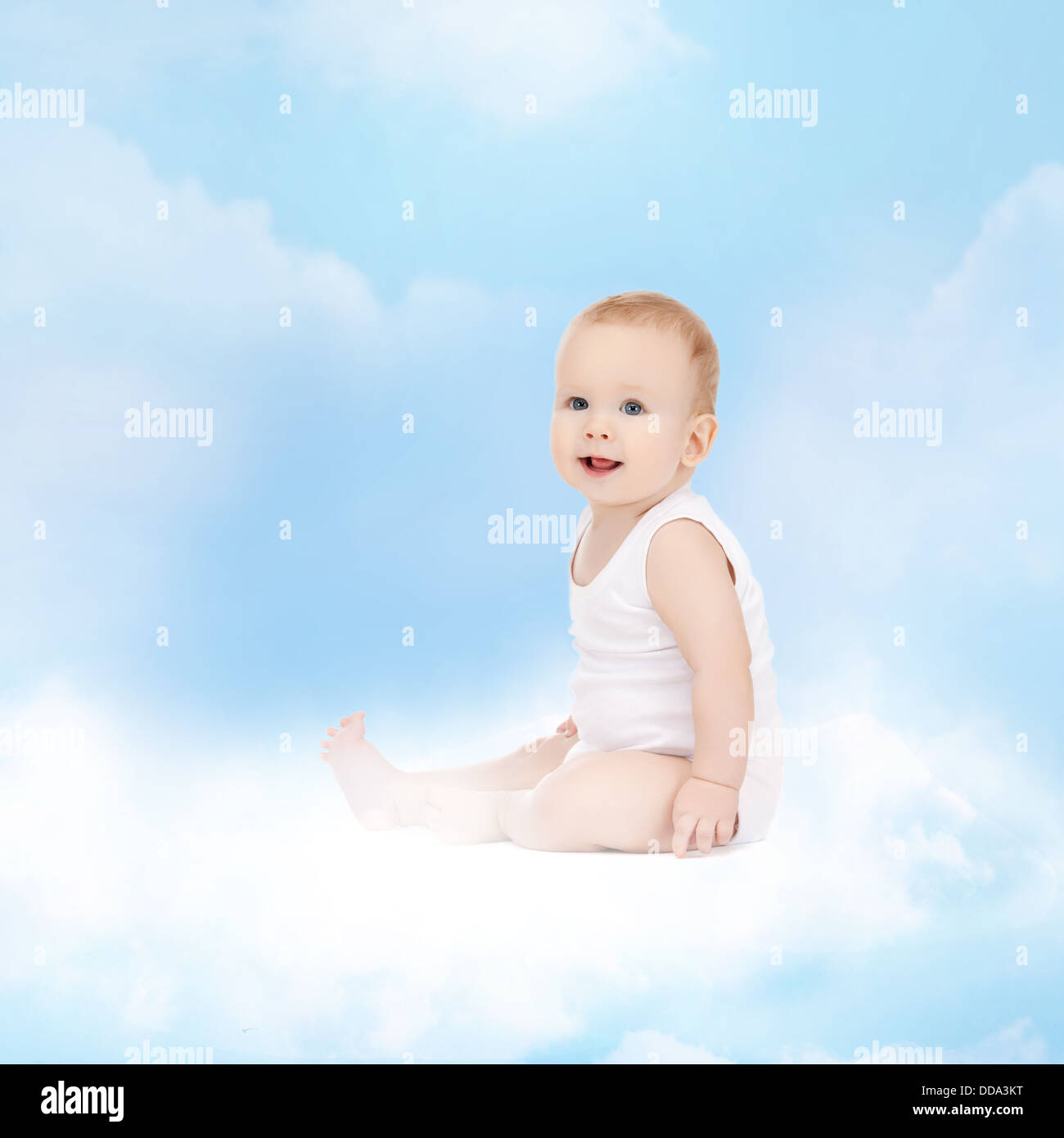 smiling baby sitting on the cloud Stock Photo - Alamy