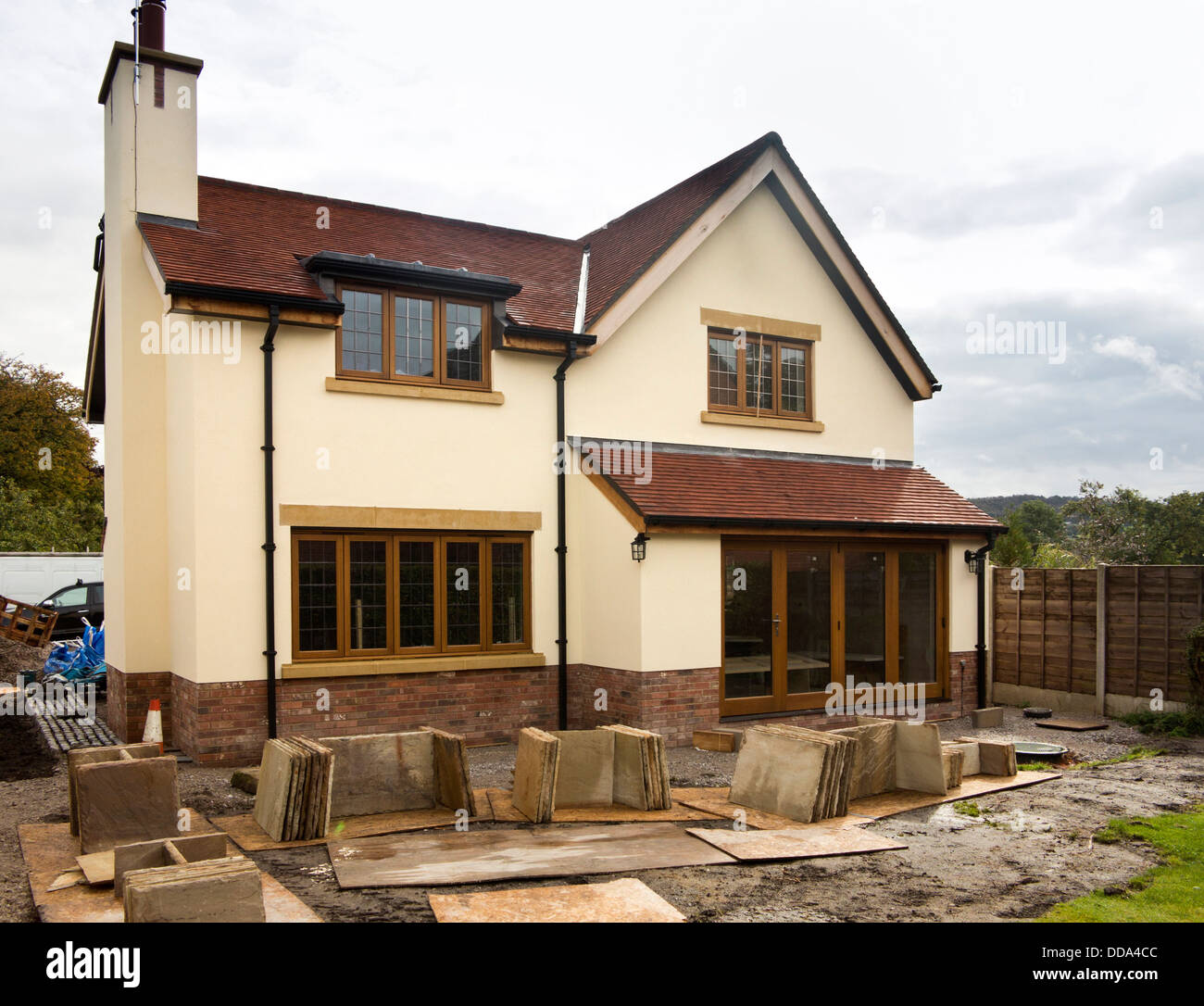 self building house, hard landscaping, sandstone paving slabs around