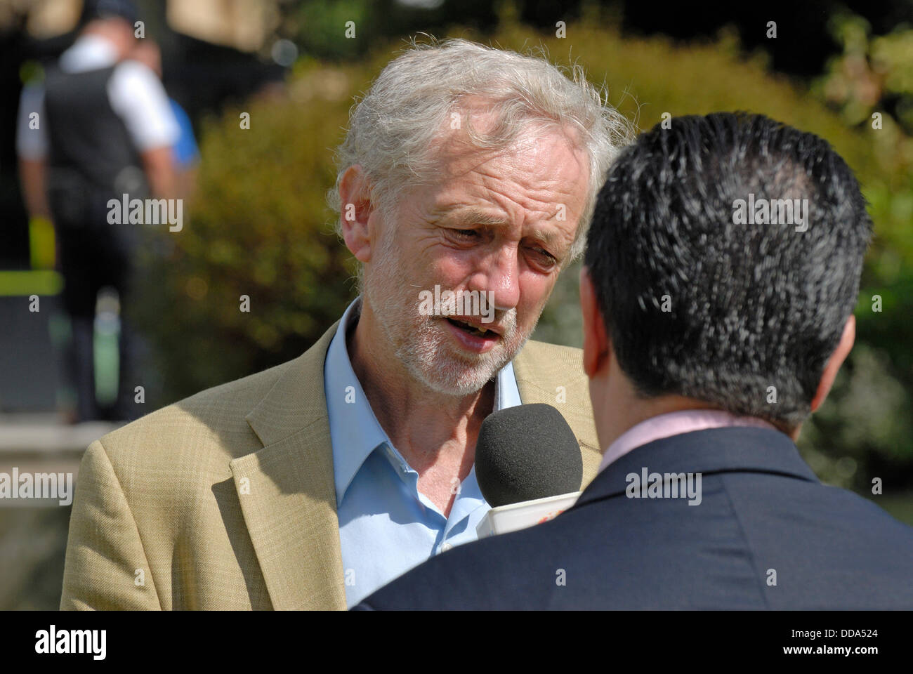 Jeremy Corbyn MP (Labour) being interviewed outside Parliament before the debate about action against Syria, 29 August 2013. Stock Photo