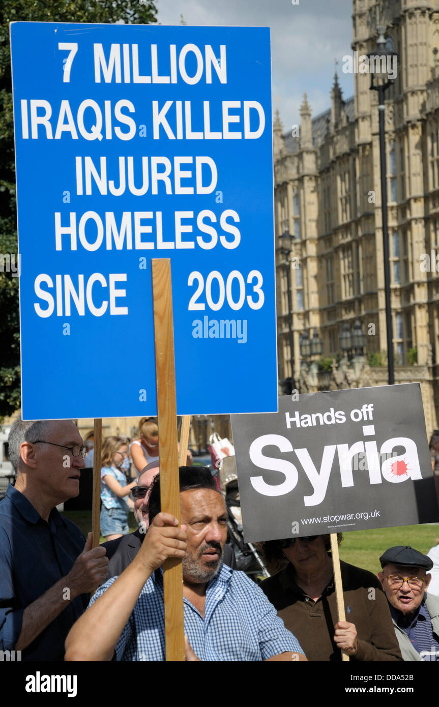 Westminster, London, UK. 29th Aug, 2012. Protest against military action in Syria. Parliament recalled to debate possible action against the Syrian regime. Stock Photo