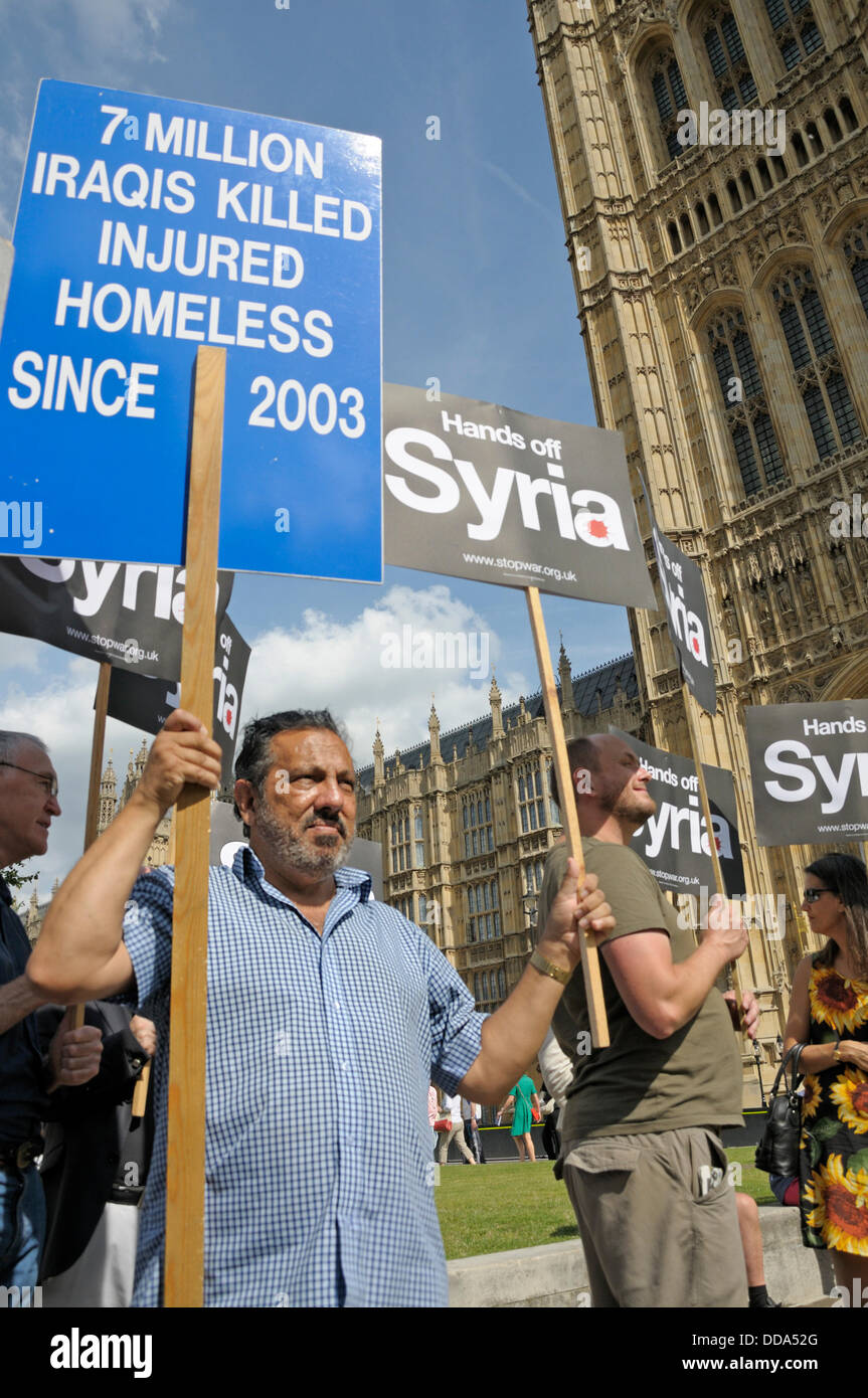 Westminster, London, UK. 29th Aug, 2012. Protest against military action in Syria. Parliament recalled to debate possible action against the Syrian regime. Stock Photo