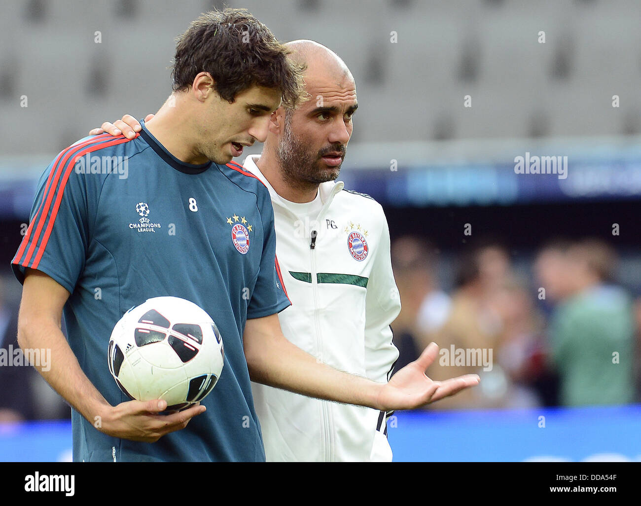Prague, Czech Republic. 29th Aug, 2013. Coach of FC Bayern Munich Pep Guardiola (right) and Javi Martinez pictured during training session in Prague, Thursday, Aug. 29, 2013. FC Bayern Munich faces FC Chelsea in Super Cup soccer match on Friday Aug. 30. (CTK Photo/Michal Dolezal) Credit:  CTK/Alamy Live News Stock Photo