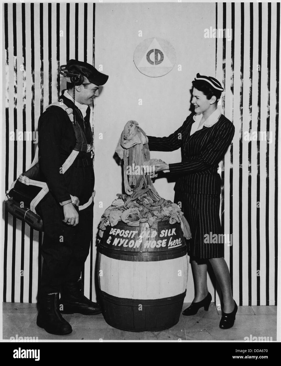 The worn out nylon stockings in this barrel full of salvaged stockings will be reprocessed and made into parachutes... - - 196427 Stock Photo