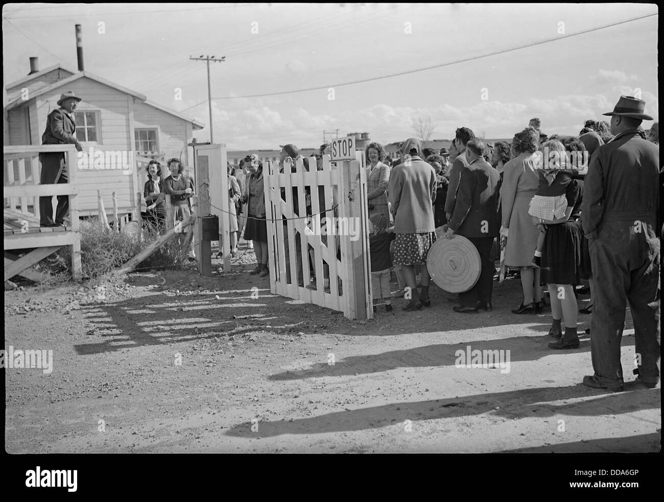 Topaz, Utah. Luther E. Hoffman, Project Director at he Central Utah Relocation Center, is shown spe . . . - - 539619 Stock Photo
