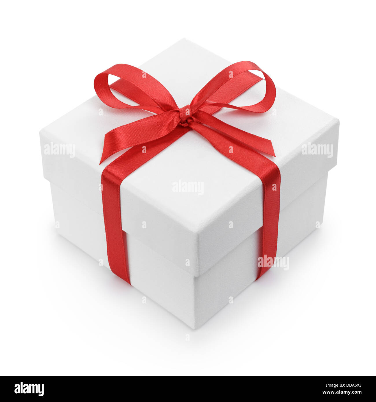 white textured gift box with red ribbon bow, isolated on white Stock ...