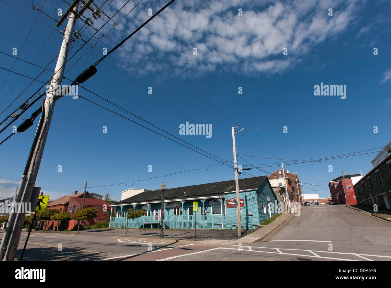 A road junction with wooden sided houses and buildings in Yarmouth