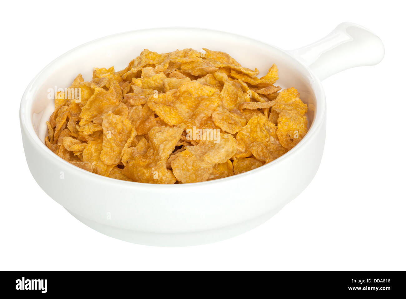 Cornflakes - a bowl of cornflakes, isolated on white, front to back focus, clipping path. Stock Photo