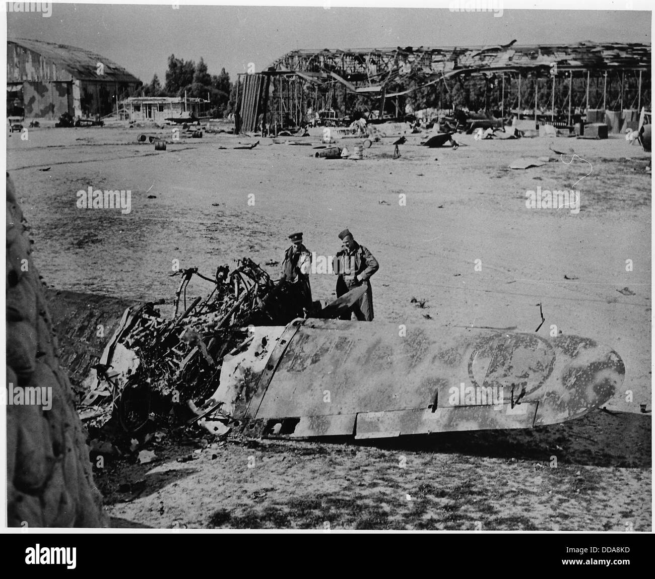 Wreckage of Italian hangers and airplanes at Castel Benito airfield ouside Tripoli. - - 196347 Stock Photo