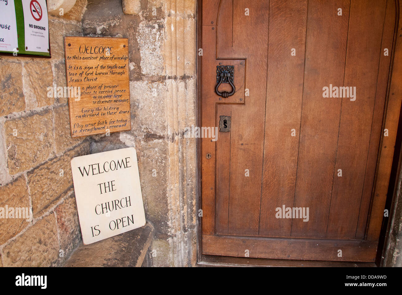 Partial View Of Closed Timber Door With Metal Knocker Or Handle