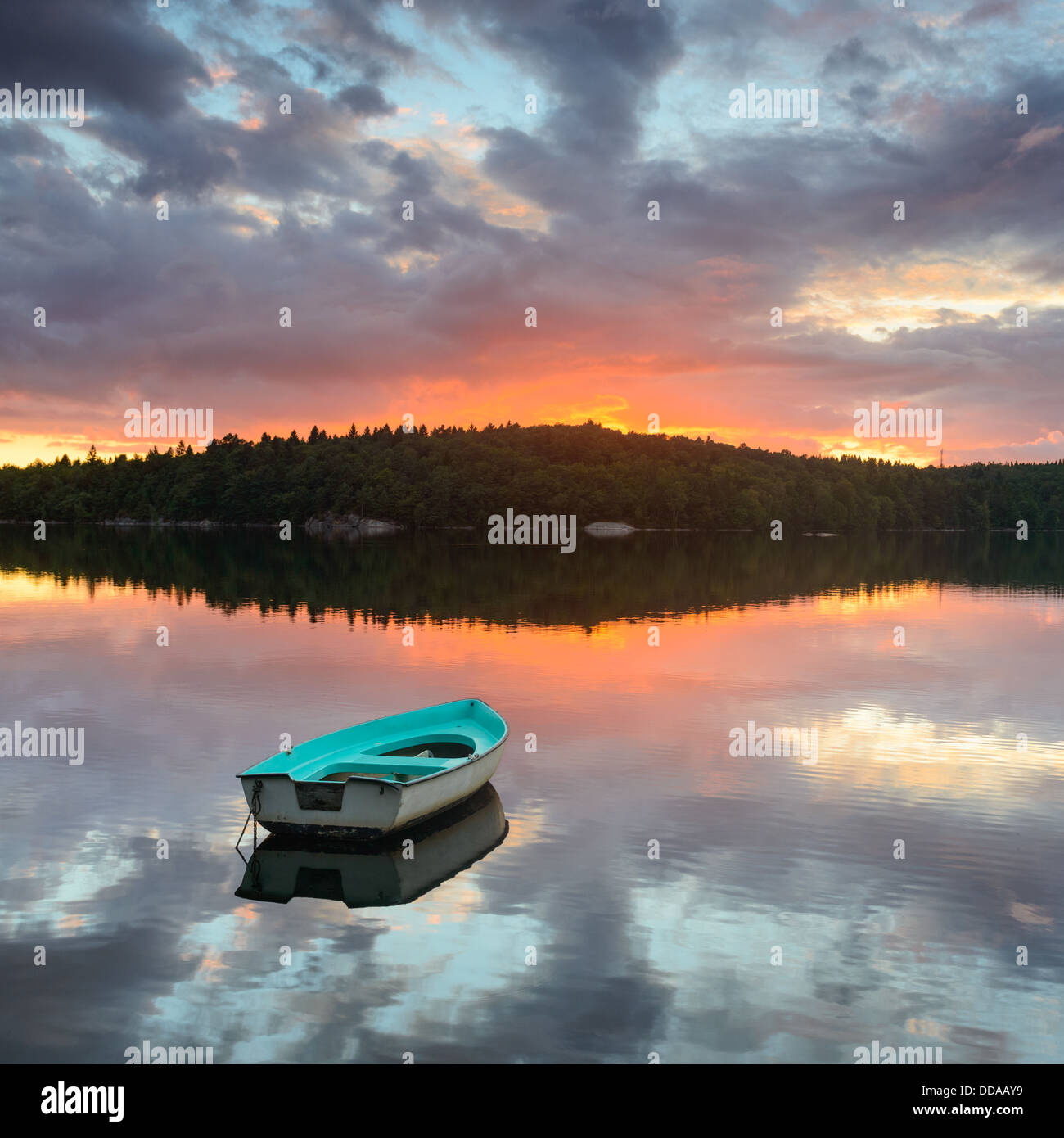 Boat on lake at sunset, Kåsjön, Gothenburg, Sweden Stock Photo - Alamy