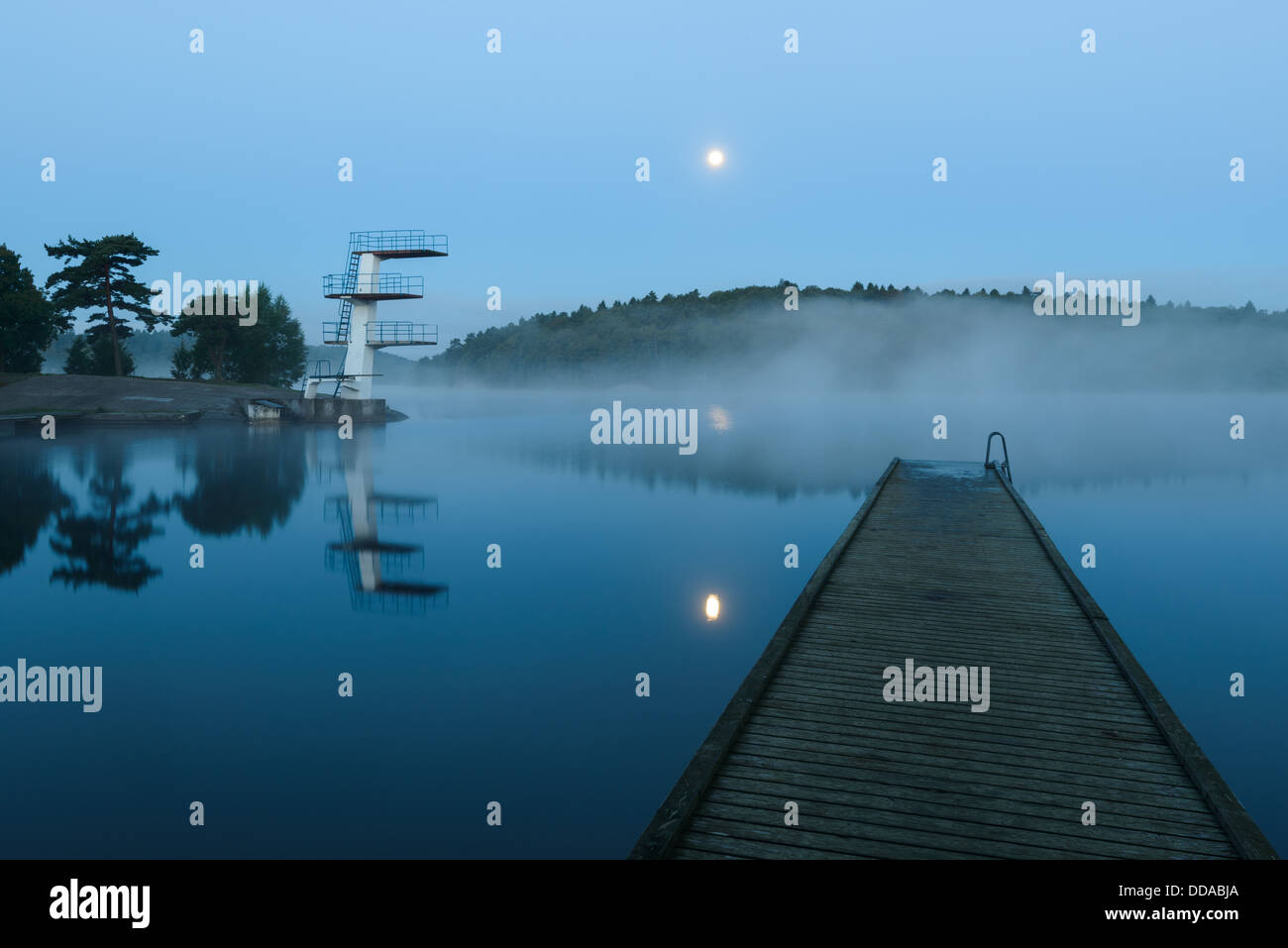 Diving platforms on lake at night, Kåsjön, Gothenburg, Sweden Stock