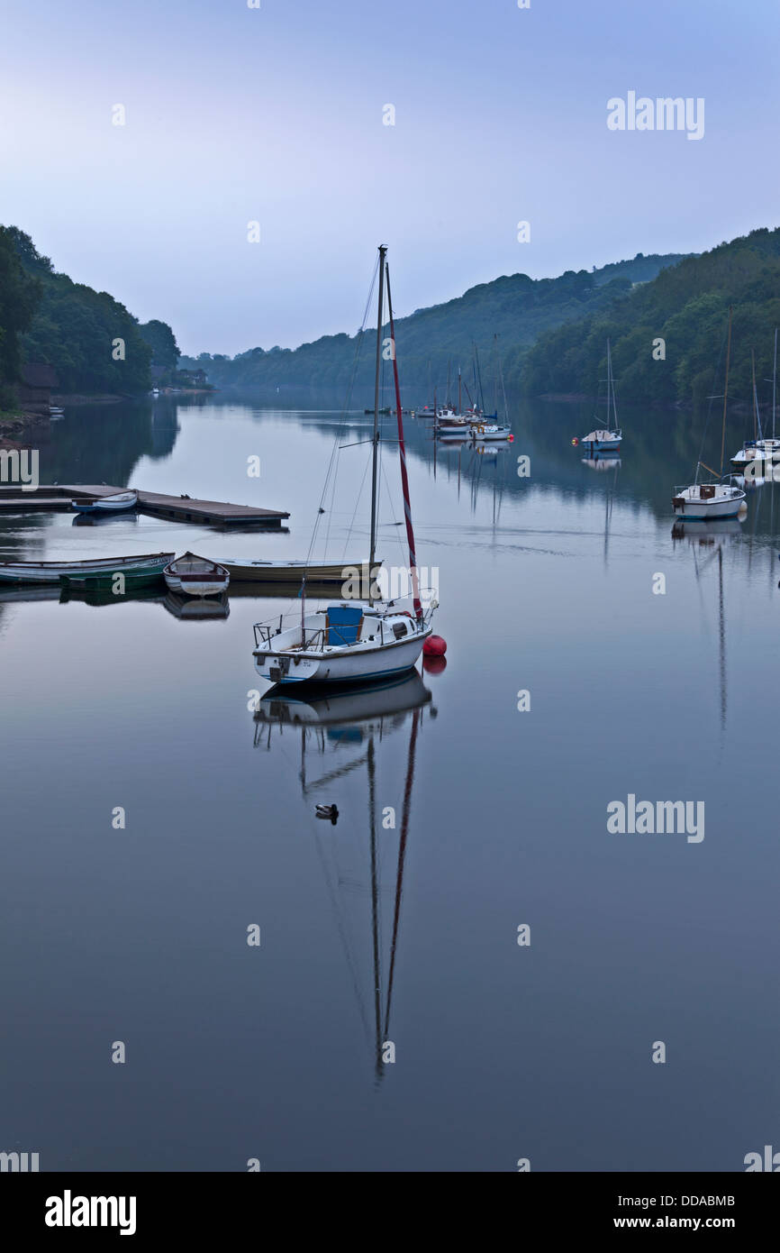 Boats moored on Rudyard Lake in the Peak District in late evening Stock