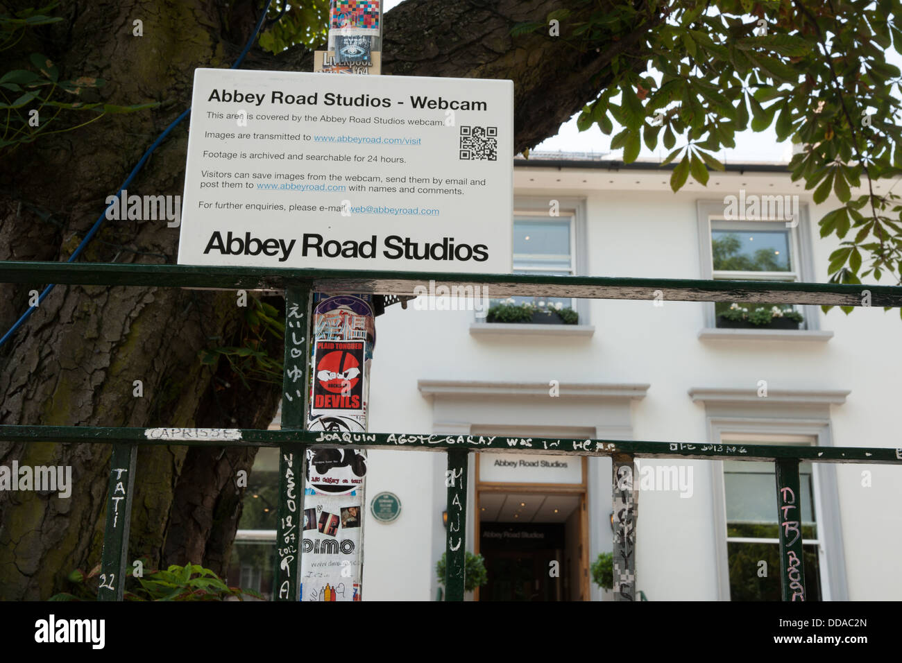 Abbey Road sudiios in the street of the same name, with webcam on fence  with QR code on sign. Made famous by Beatles in 1960's Stock Photo - Alamy