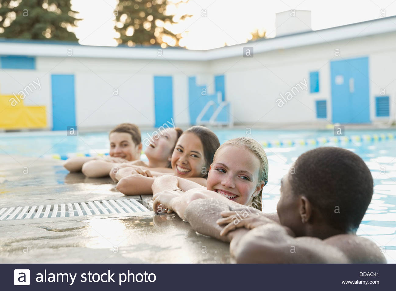 Group of teenagers swimming Stock Photo