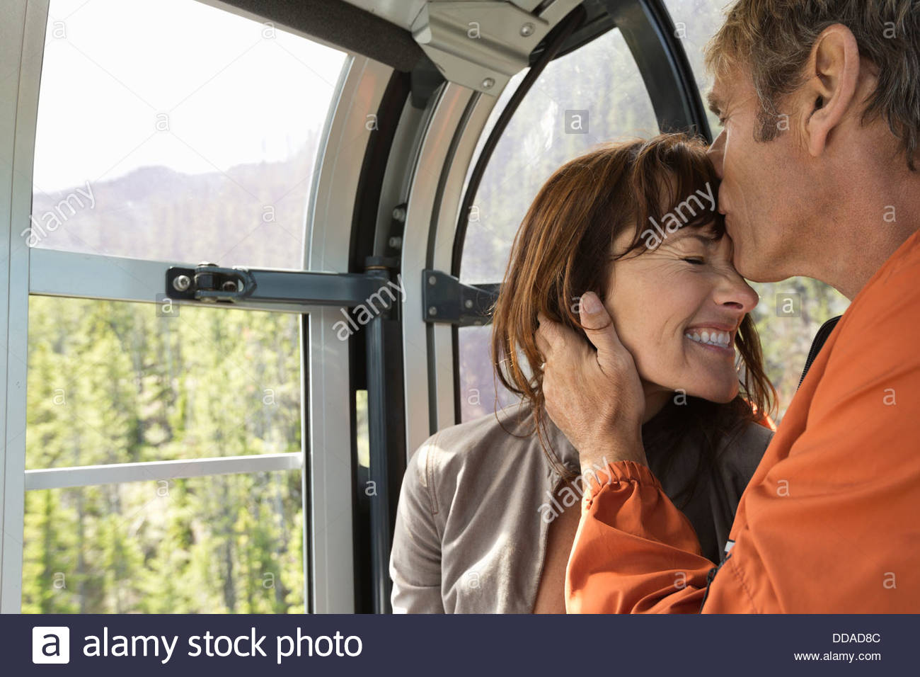 Affectionate mature couple on gondola Stock Photo Alamy