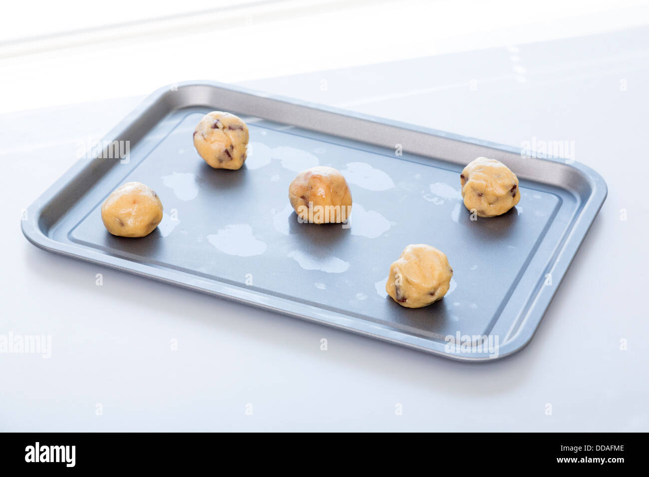 unbaked cookies on tray Stock Photo