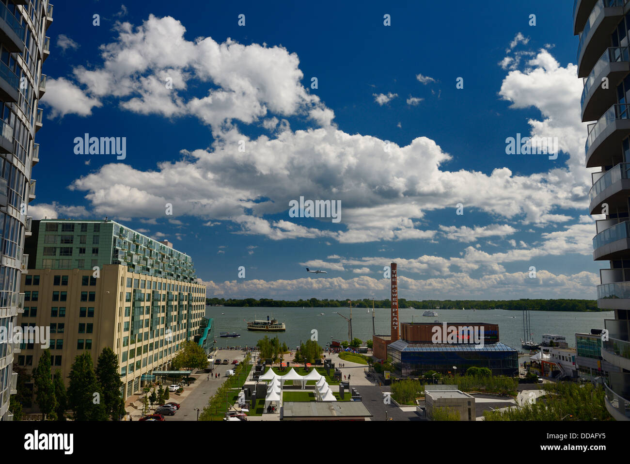 View at Toronto Harbourfront with landing plane and boats on Lake