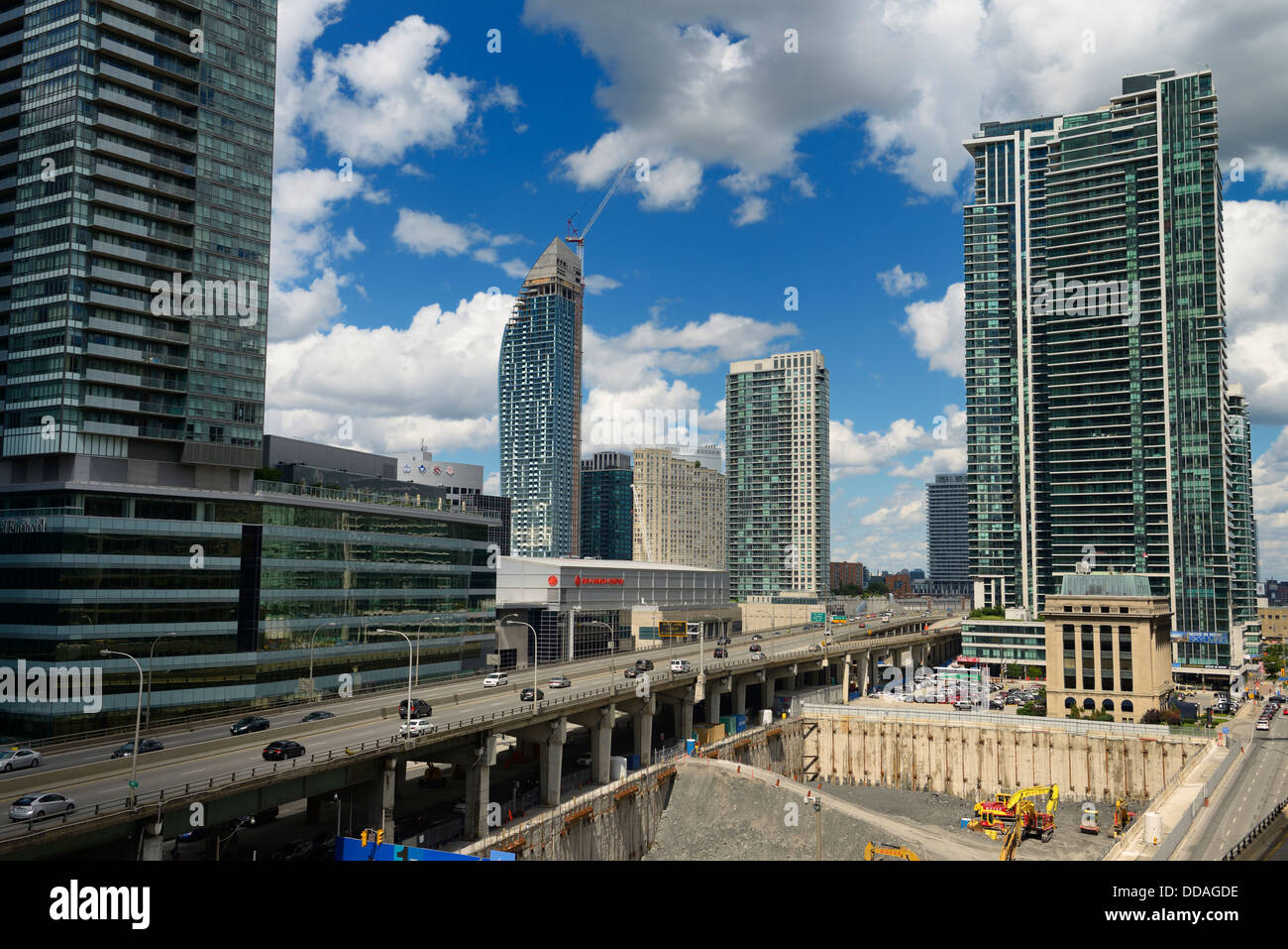 New construction along the Gardiner Expressway downtown Toronto including the L Tower and Air Canada Centre Stock Photo