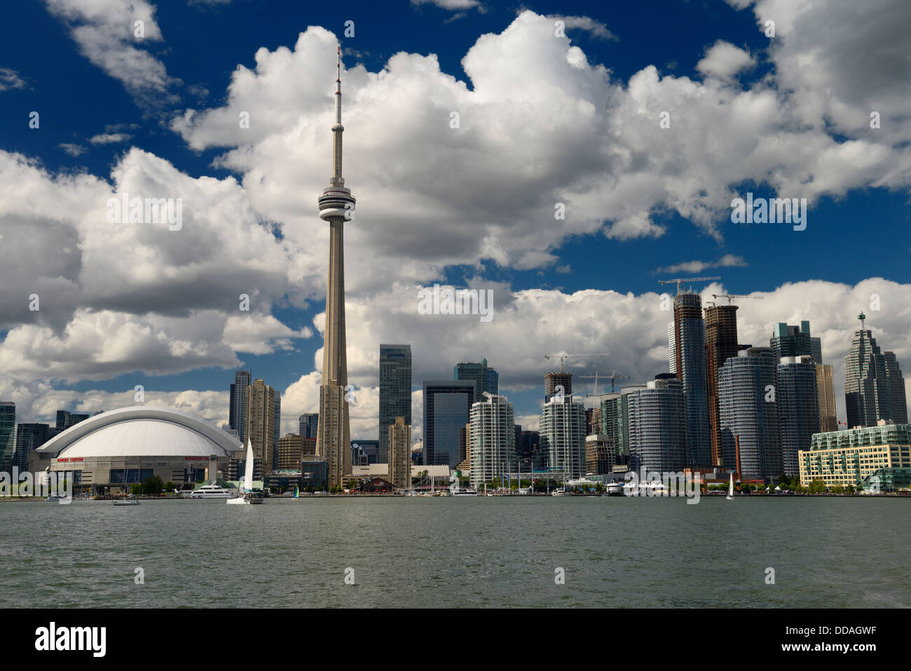 Downtown Toronto cityscape skyline with CN tower and skydome Rogers Centre Lake Ontario from the Ferry to the Island Stock Photo