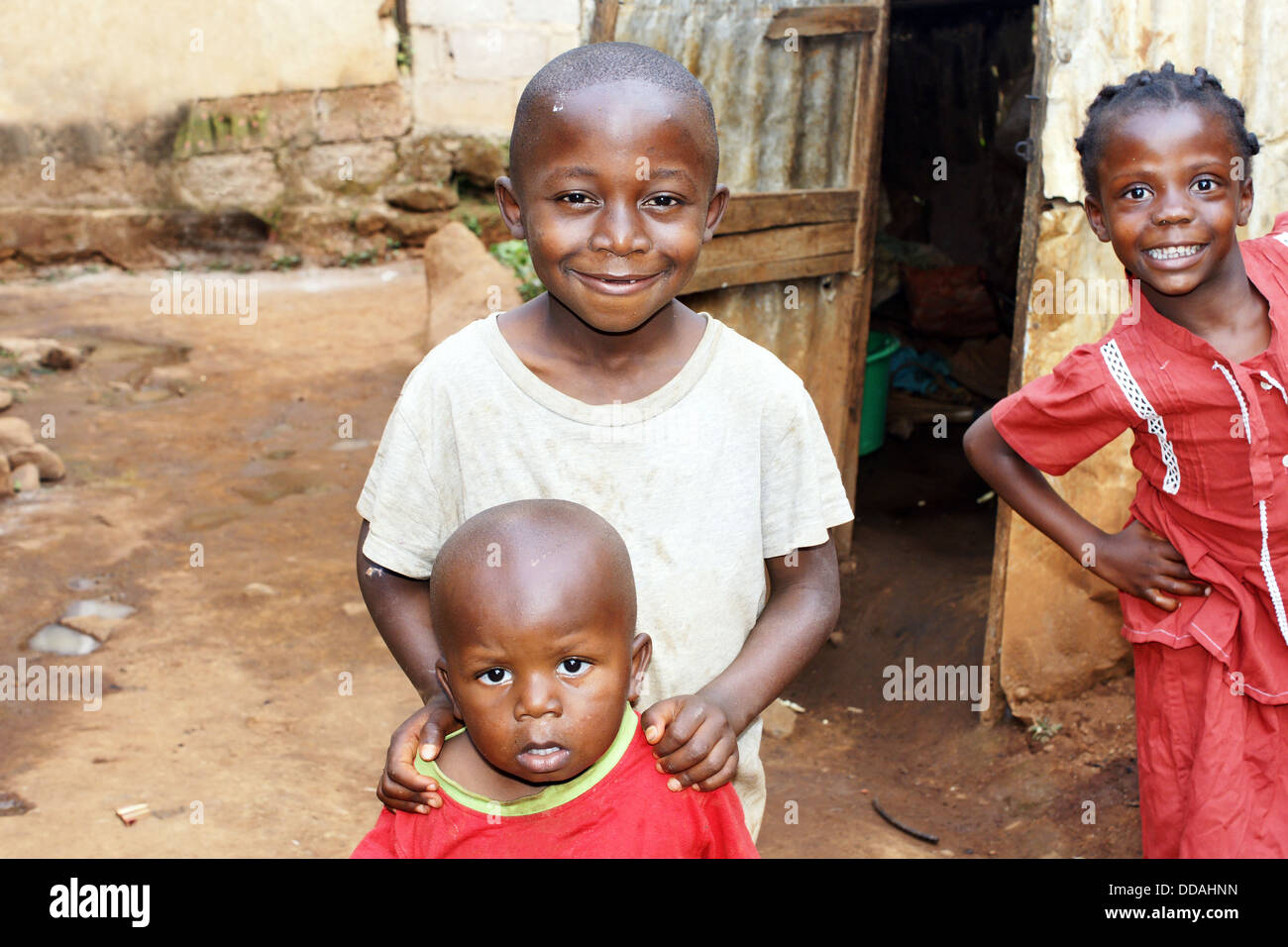 African kids: two little brothers and a girl at home Stock Photo
