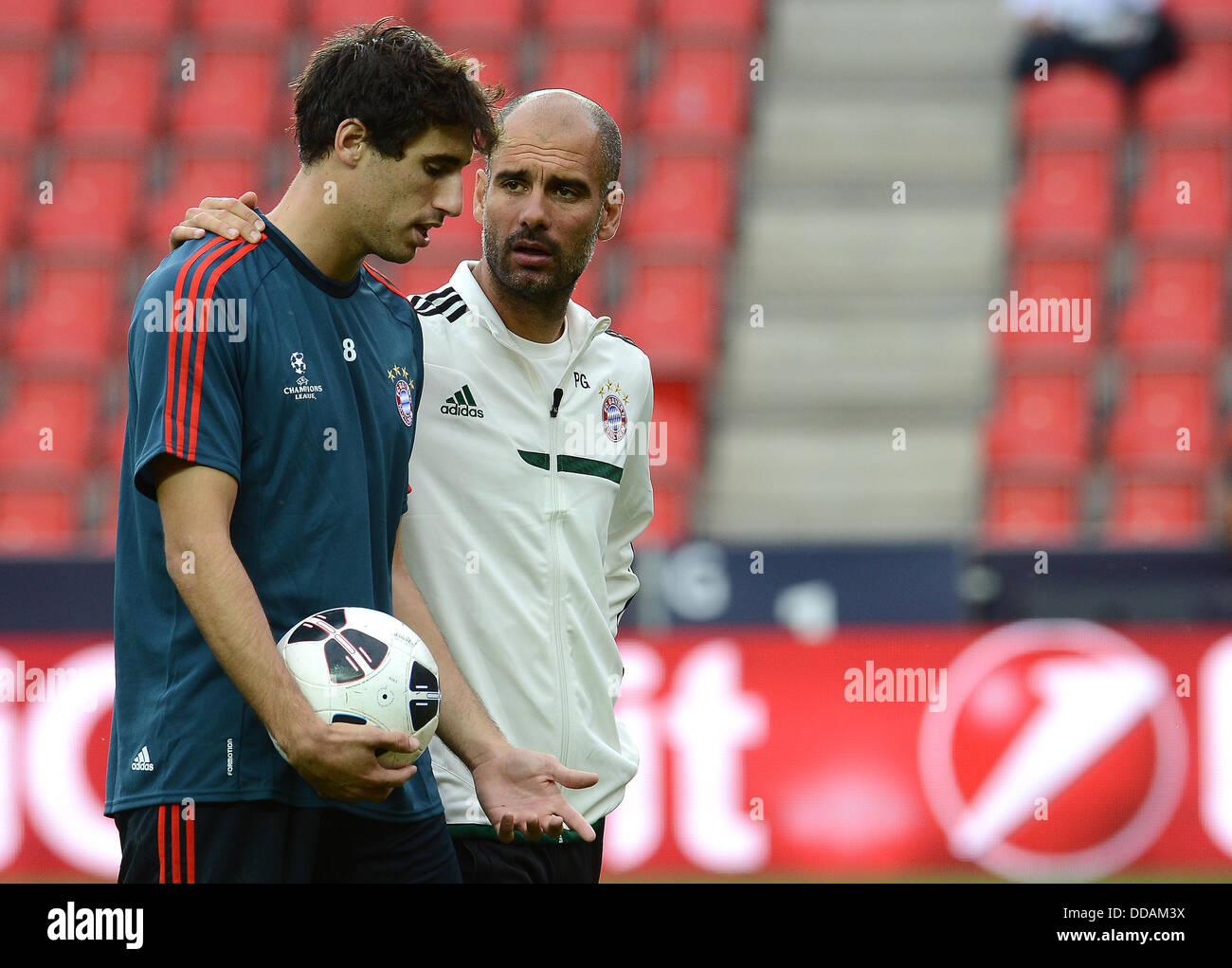Prague, Czech Republic. 29th Aug, 2013. Coach of FC Bayern Munich Pep Guardiola, right, and Javi Martinez pictured during the training session in Prague, Czech Republic, on Thursday, August 29, 2013. FC Bayern Munich faces FC Chelsea in Super Cup soccer match on Friday August 30. Credit:  Katerina Sulova/CTK Photo/Alamy Live News Stock Photo
