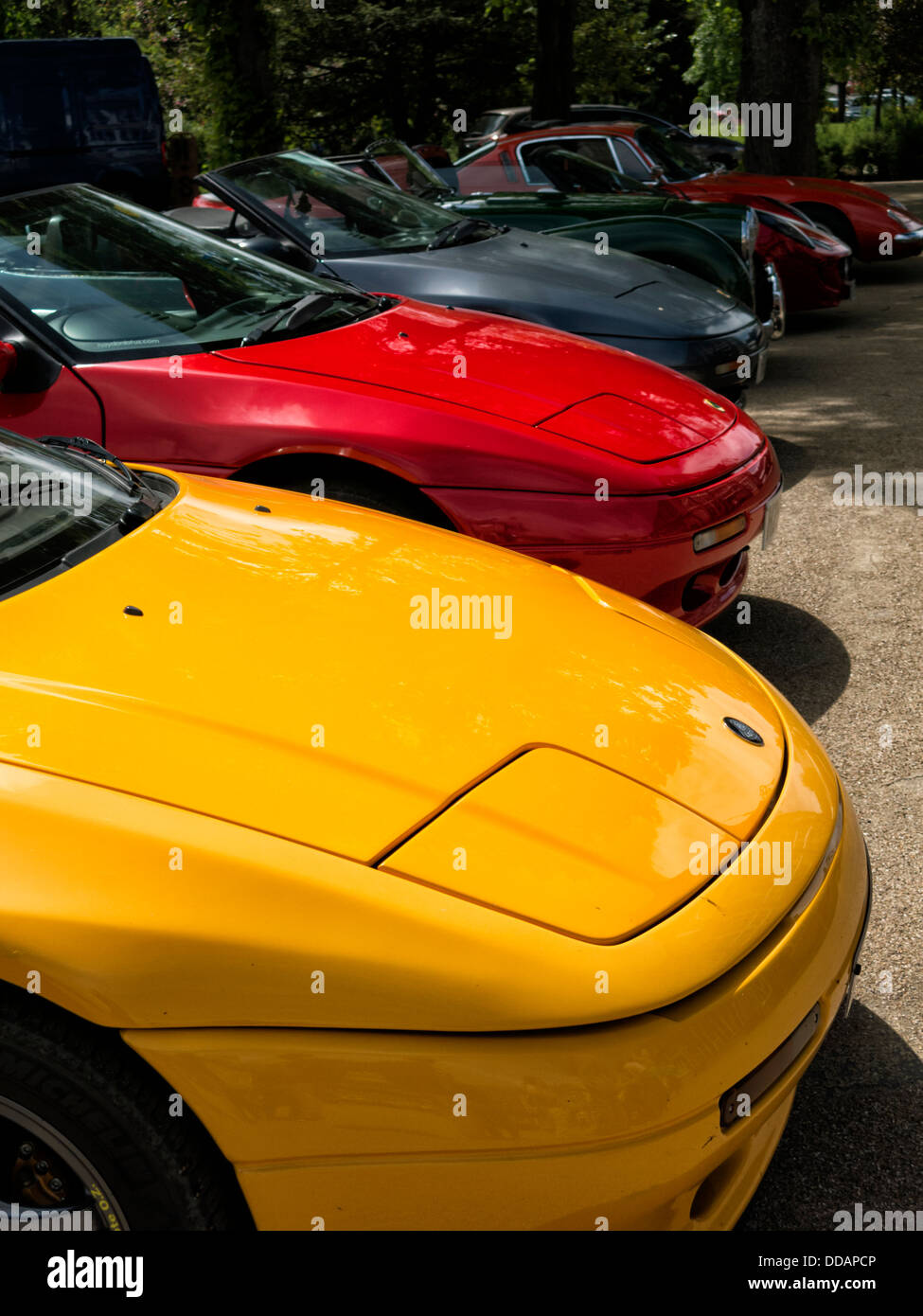 Different colored bonnets of Lotus sports cars on display at classic car  rally Buxton Derbyshire England Stock Photo - Alamy
