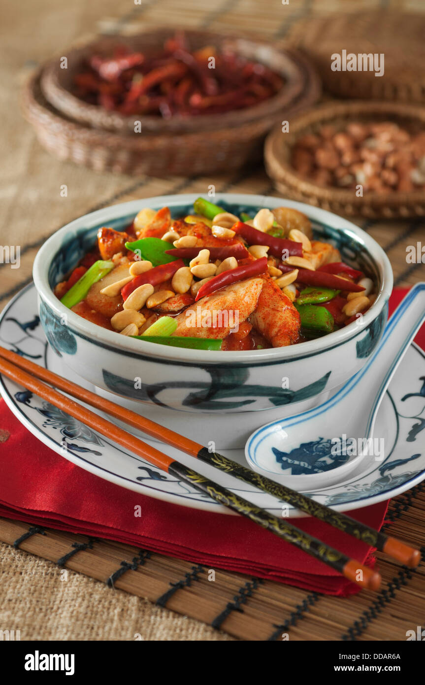 Kung pao chicken with peanuts and chili peppers Chinese food Stock