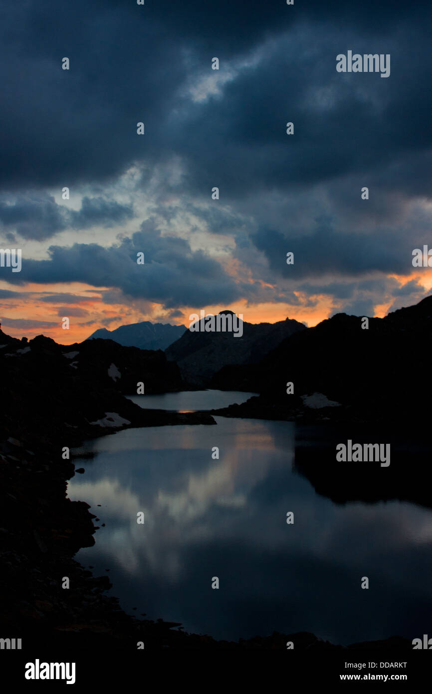 Mountain lake at sunset Stock Photo - Alamy