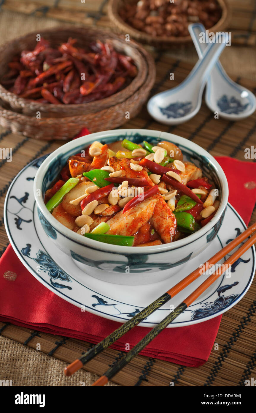 Kung pao chicken with peanuts and chili peppers Chinese food Stock