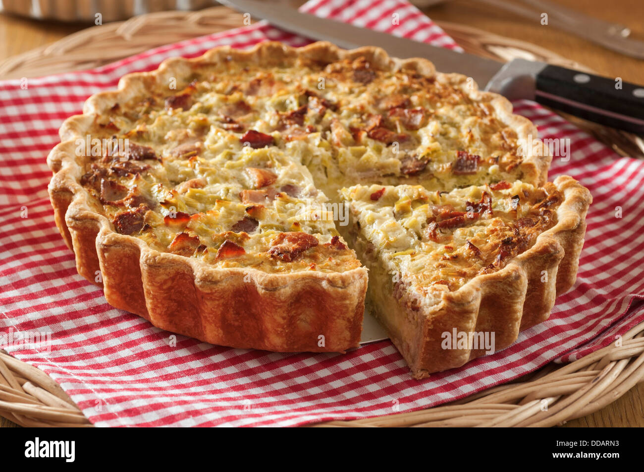 Flamiche aux poireaux. Leek and cheese tart. France Food Stock Photo