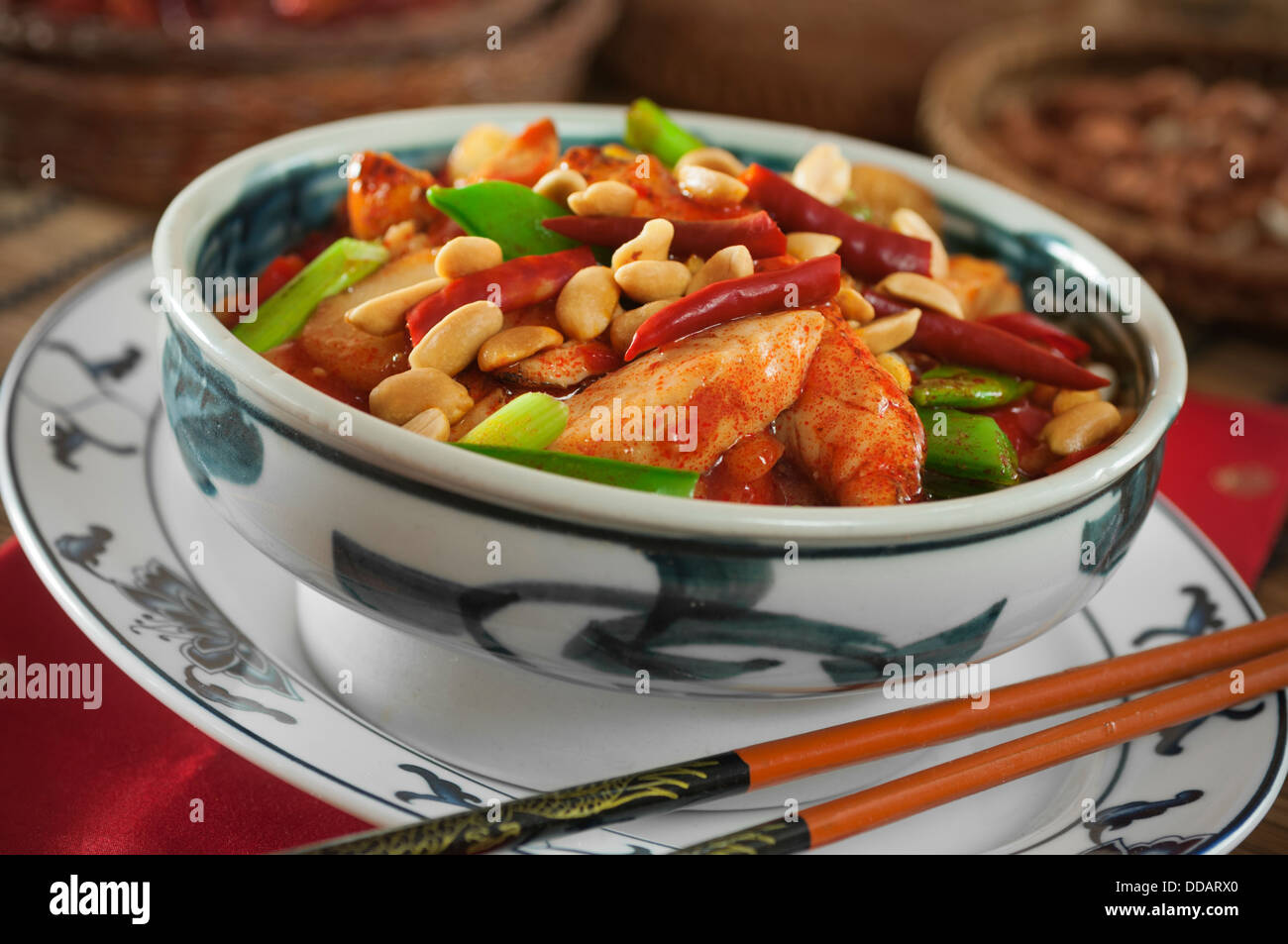 Kung pao chicken with peanuts and chili peppers Chinese food Stock