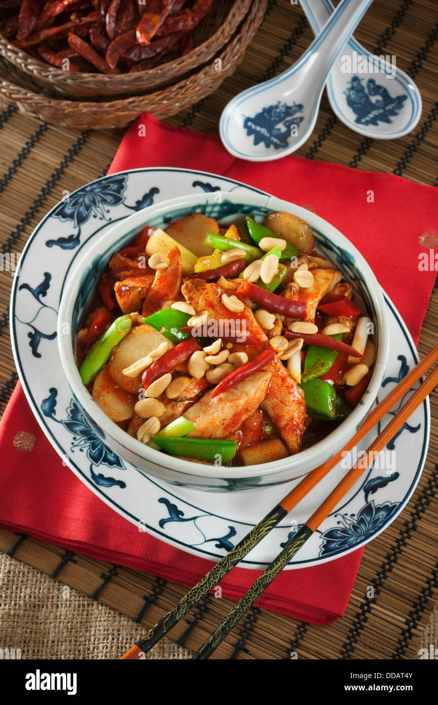 Kung pao chicken with peanuts and chili peppers Chinese food Stock