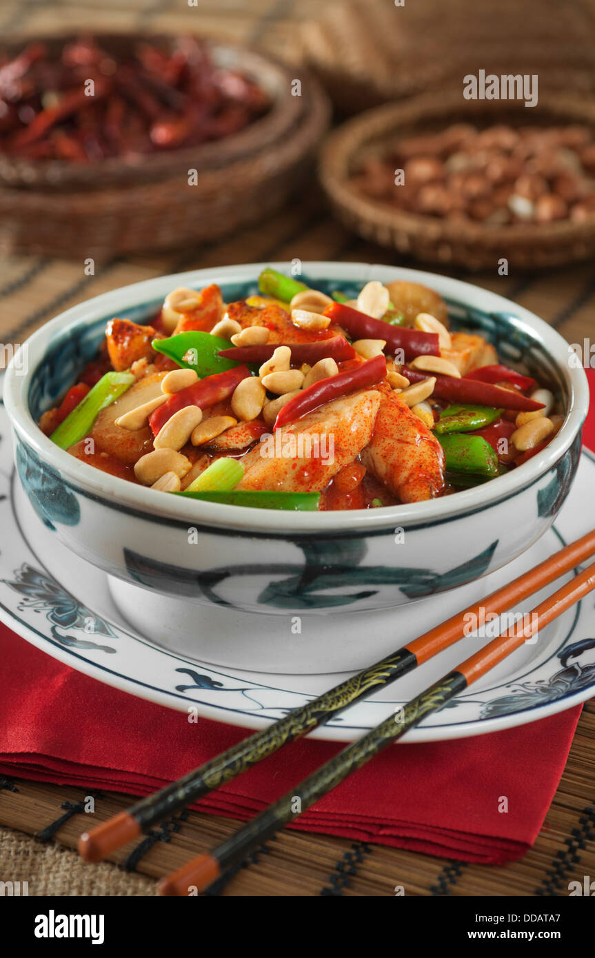 Kung pao chicken with peanuts and chili peppers Chinese food Stock