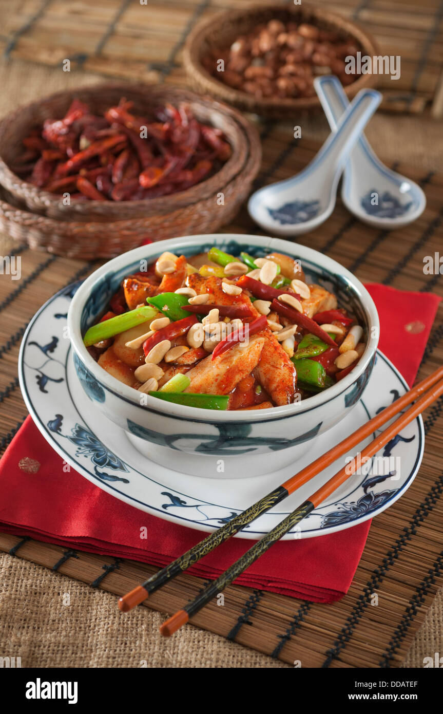 Kung pao chicken with peanuts and chili peppers Chinese food Stock Photo