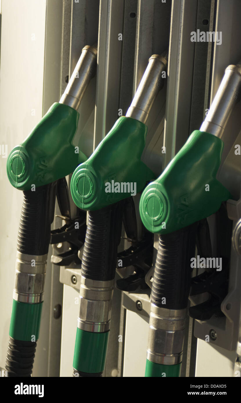 Gas pump handles at gas station in Denmark Stock Photo Alamy